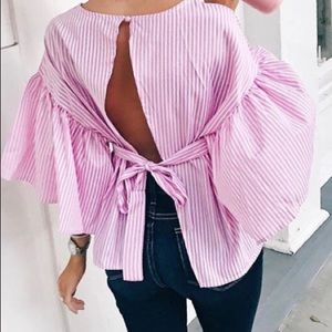 Beautiful pink open back shirt